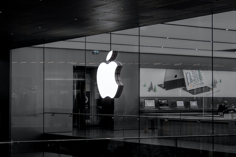 grayscale photo of Apple emblem